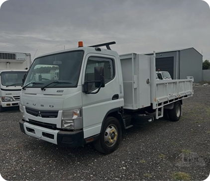 Small white tipper truck